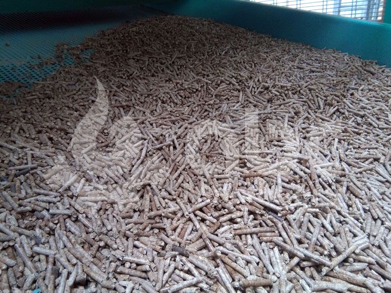 manufactured wood pellets out of cooling machine