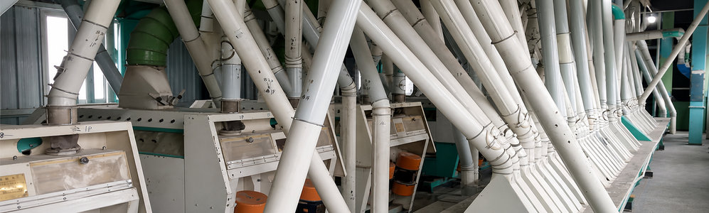 wheat flour milling line assembled with stainless spouting and the roll adjustment handwheel on the mill